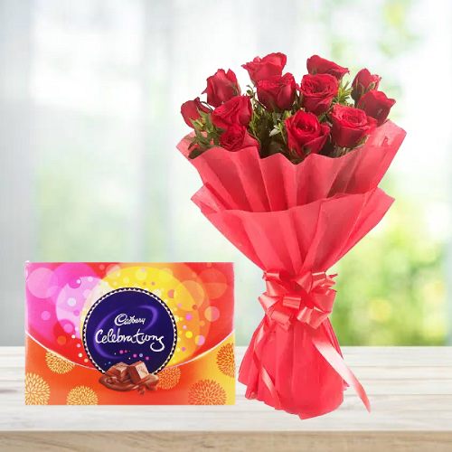 Buy Now Red Rose Stylish Bouquet with Celebration Pack in Tasty Treat Cakes