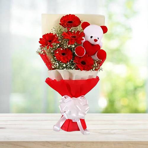 Buy online Teddy with Red Gerbera Flowers Bouquet to India