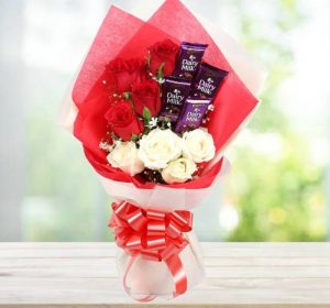 Buy online Delivery Dairy Milk Chocolates with Mixed Roses Bouquet